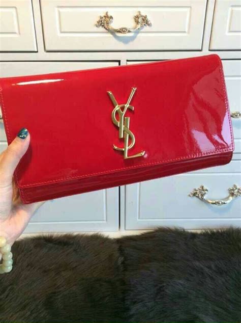 ysl red tassel clutch|ysl tuxedo clutch.